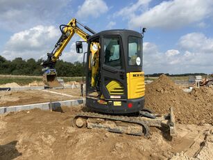 Ellesen ApS om New Holland E26c - Anker Bjerre A/S