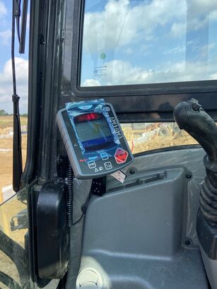 Ellesen ApS om New Holland E26c - Anker Bjerre A/S