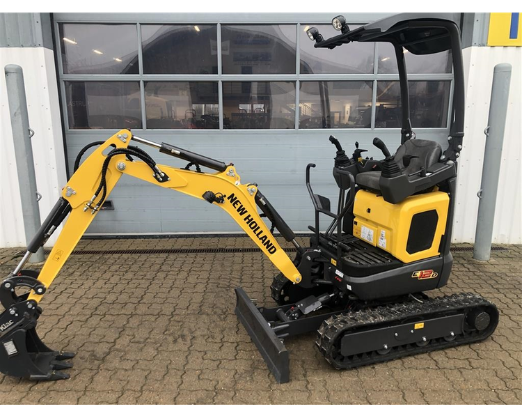 New Holland E12D new holland nye minigraver på vej hjem