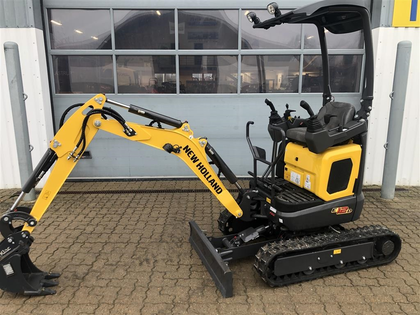New Holland E12D new holland nye minigraver på vej hjem