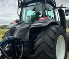 Valtra T214 m. Flisvogn fra Kronos / Alsidig Maskinfabrik