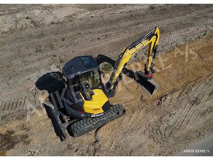 Plakat - New Holland E60D minigraver | Anker Bjerre A/S